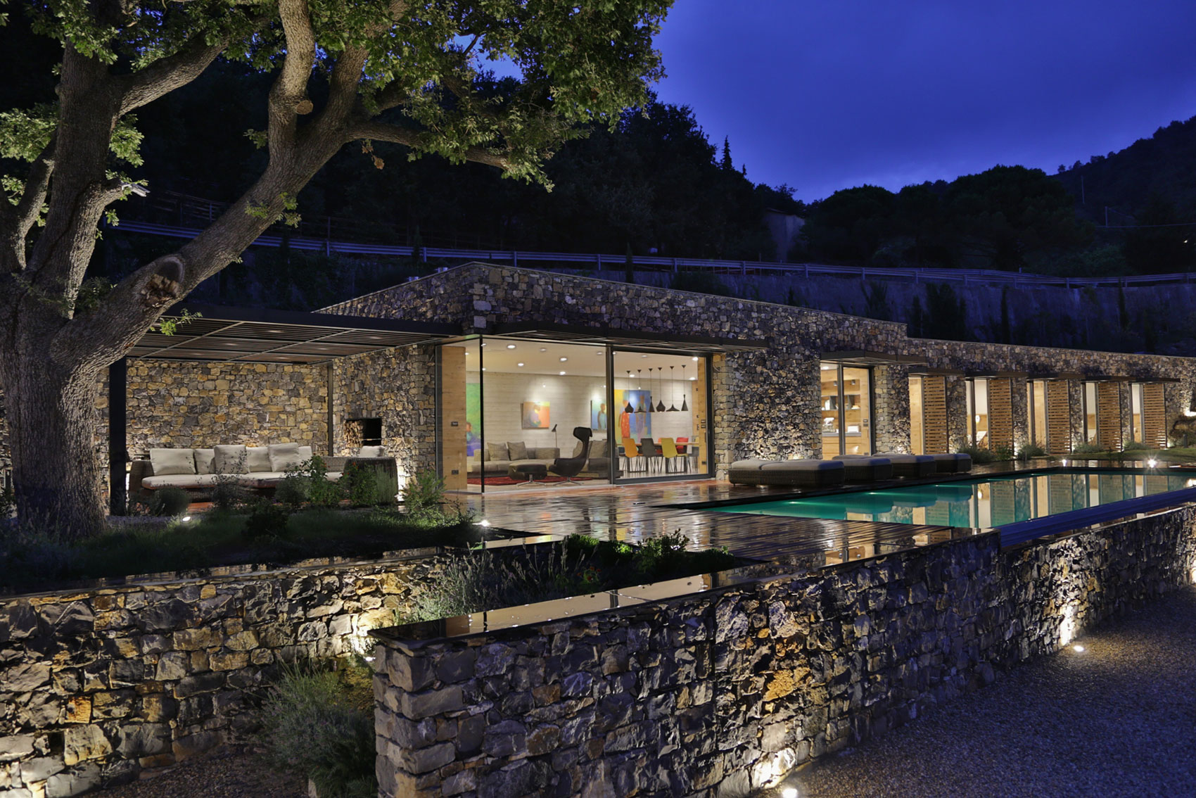 An Elegant Mediterranean Villa with Natural Stone Façade in Imperia, Italy by Giordano Hadamik Architects (26)