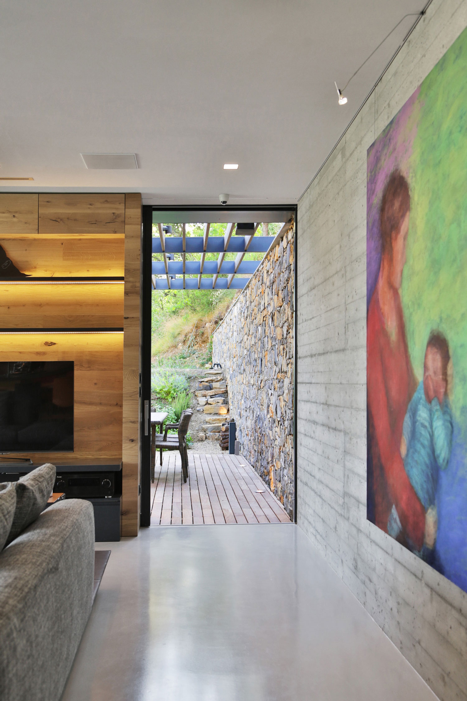 An Elegant Mediterranean Villa with Natural Stone Façade in Imperia, Italy by Giordano Hadamik Architects (7)