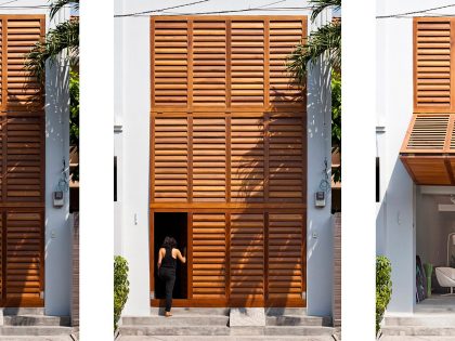 An Elegant and Light-Filled Modern Townhouse with a Folding-Up Shutter in Ho Chi Minh by MM++ architects (4)
