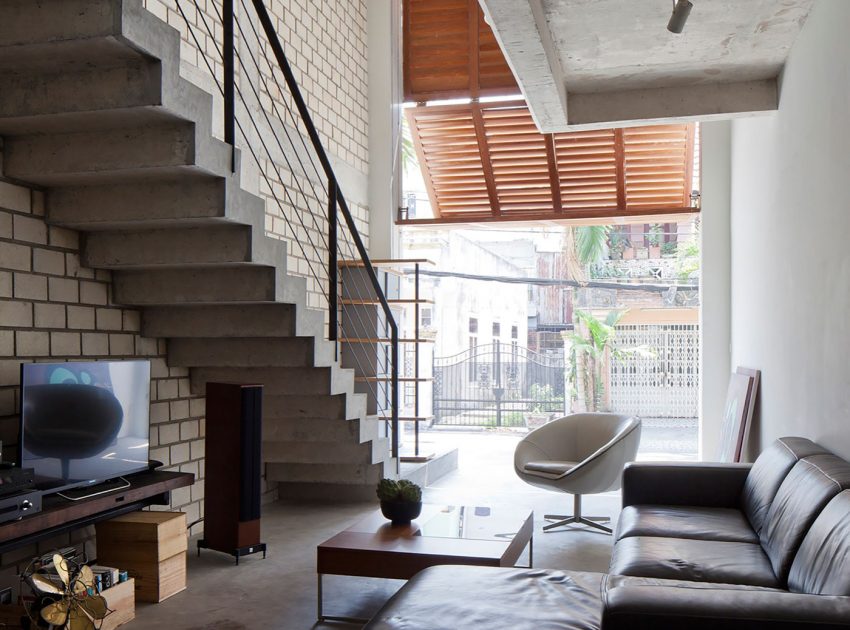 An Elegant and Light-Filled Modern Townhouse with a Folding-Up Shutter in Ho Chi Minh by MM++ architects (8)