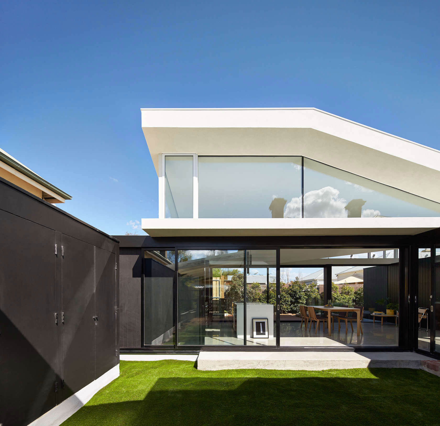A Contemporary House Framed by Reclaimed Bricks and Separated Glass in Hawthorn by MODO (1)