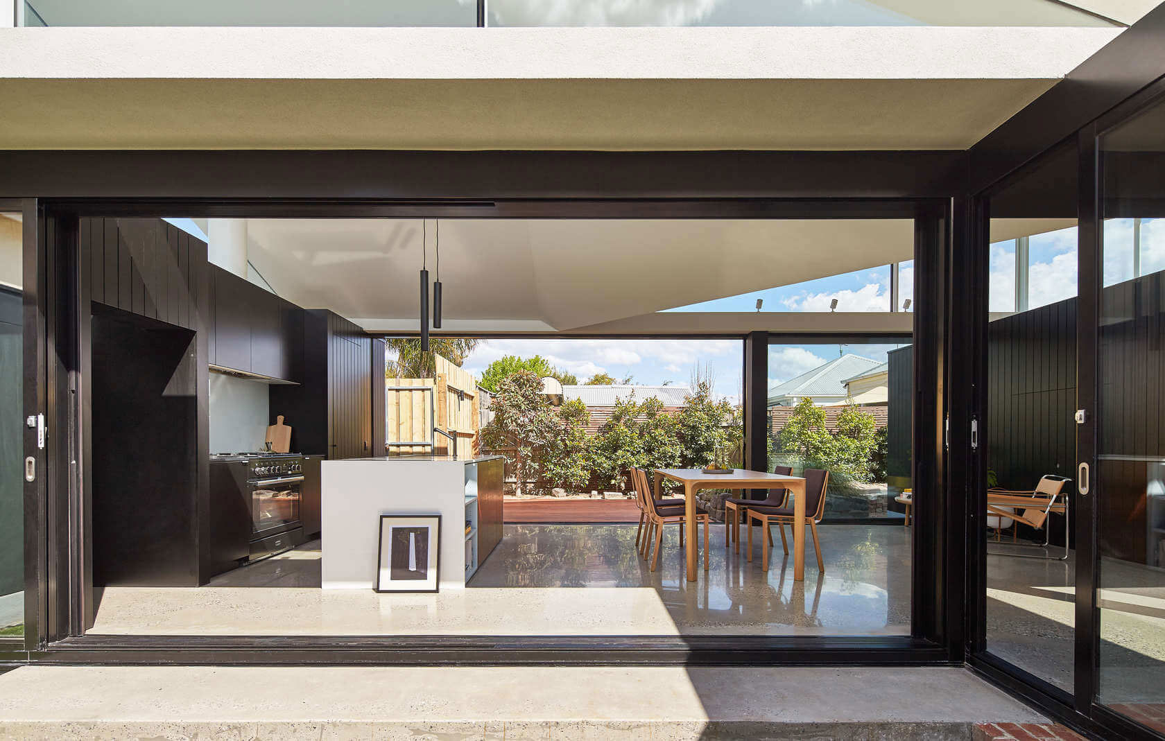 A Contemporary House Framed by Reclaimed Bricks and Separated Glass in Hawthorn by MODO (2)