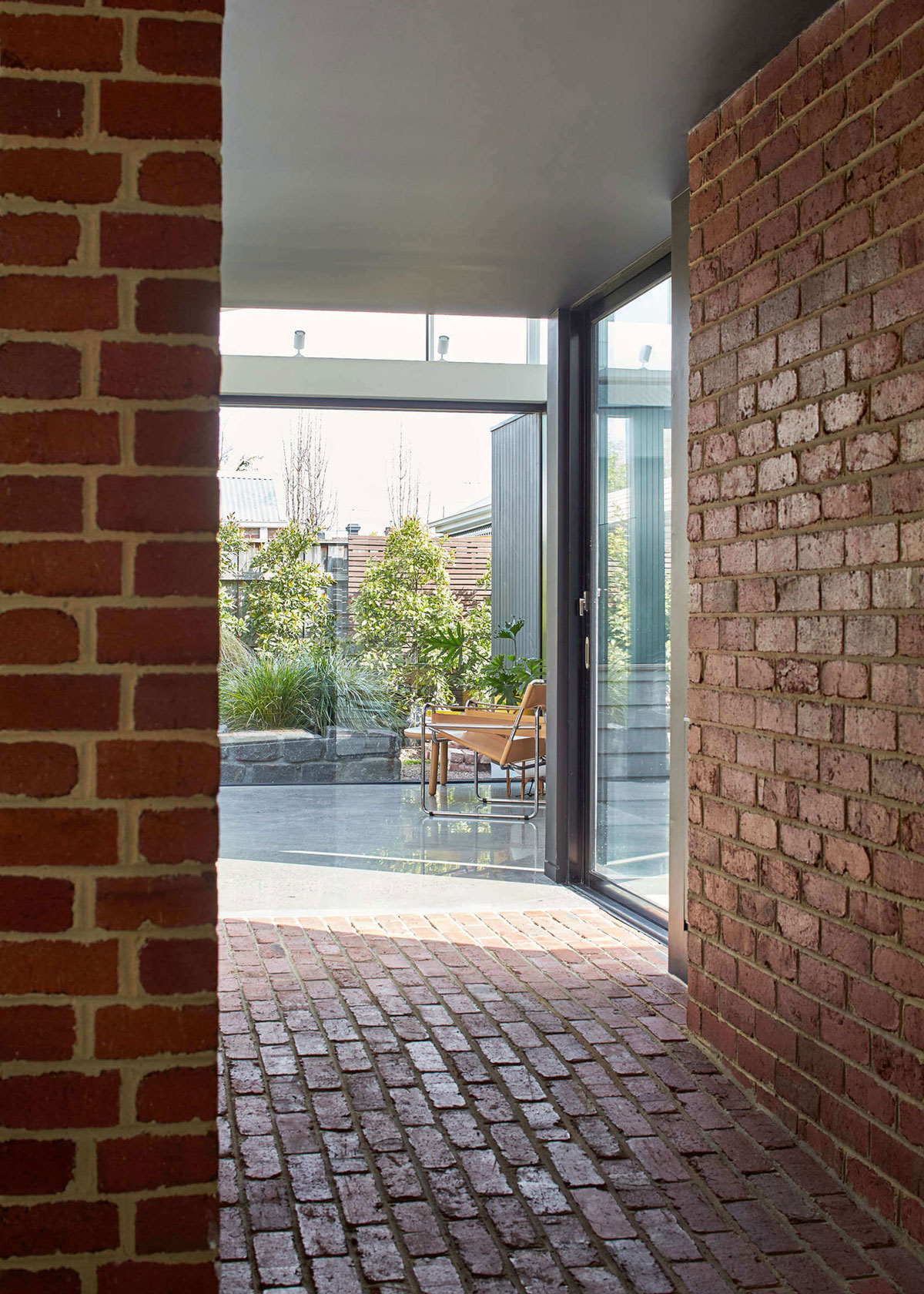A Contemporary House Framed by Reclaimed Bricks and Separated Glass in Hawthorn by MODO (7)