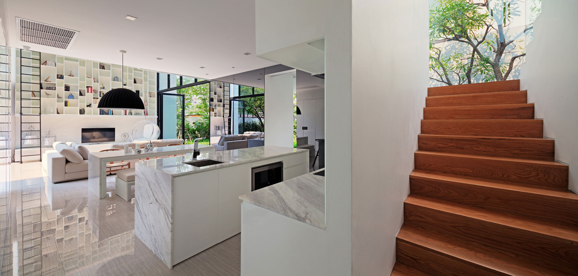 An Ultra-Modern Family Home with Spacious and Warm Interior in Bangkok by Ayutt and Associates Design (6)