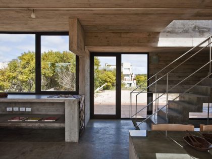 A Beautiful Concrete Home Nestled in the Beach and Forest of Villa Gesell, Argentina by BAK Architects (12)