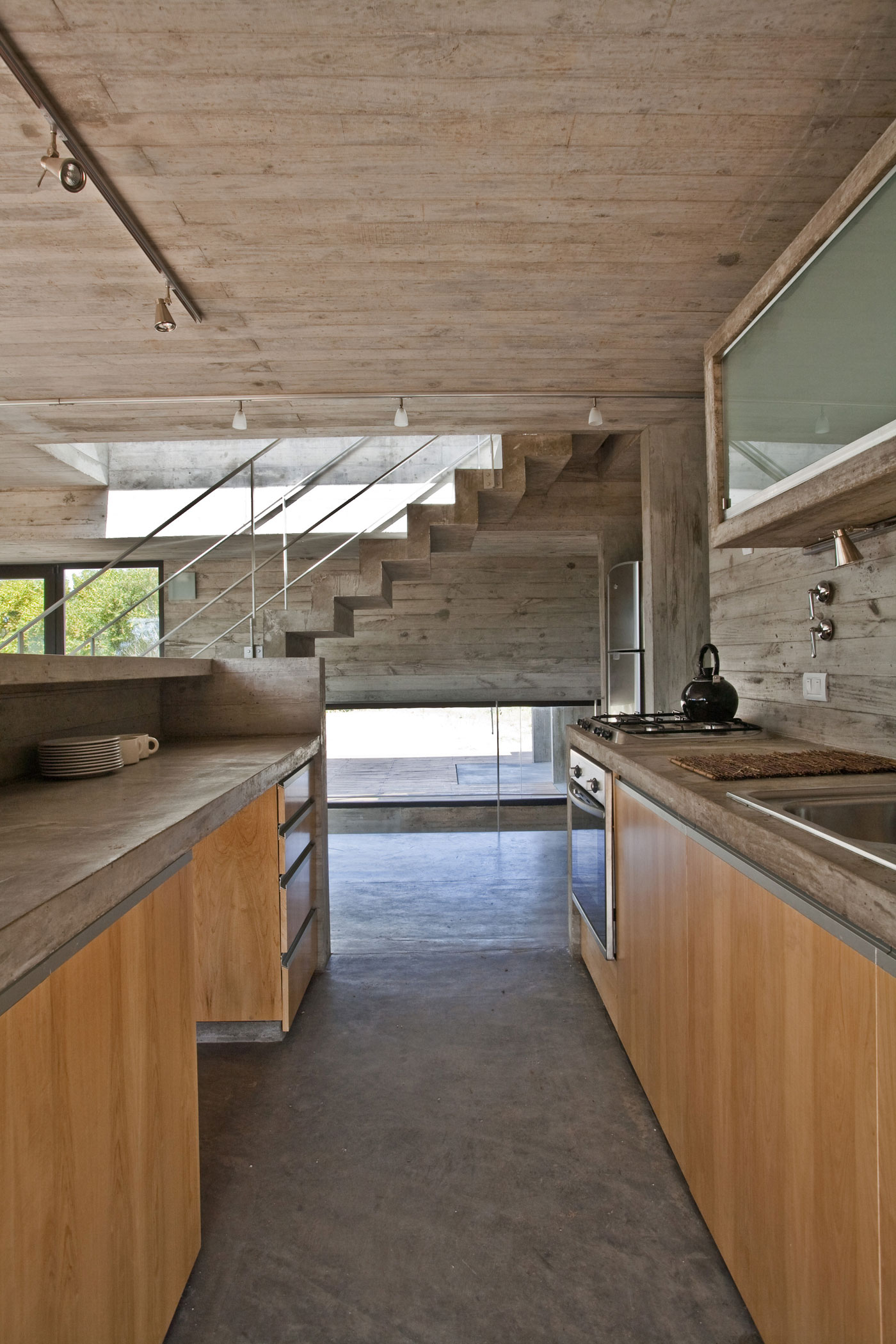 A Beautiful Concrete Home Nestled in the Beach and Forest of Villa Gesell, Argentina by BAK Architects (17)