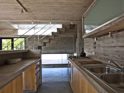 A Beautiful Concrete Home Nestled in the Beach and Forest of Villa Gesell, Argentina by BAK Architects (18)