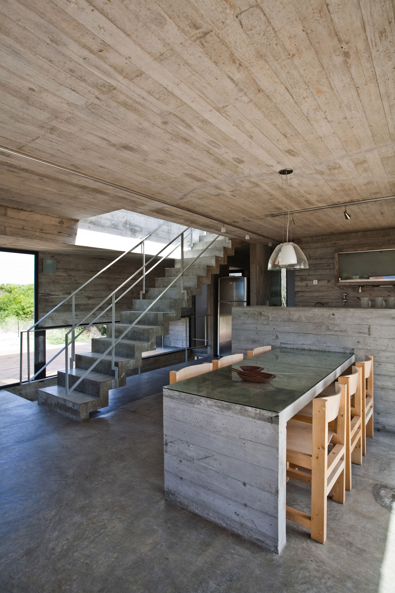 A Beautiful Concrete Home Nestled in the Beach and Forest of Villa Gesell, Argentina by BAK Architects (20)
