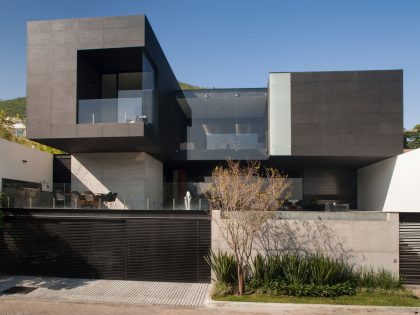 A Beautiful Modern Home with Cantilevered Volume and Floor-to-Ceiling Glass Walls in Garza Garcia by GLR Arquitectos (2)