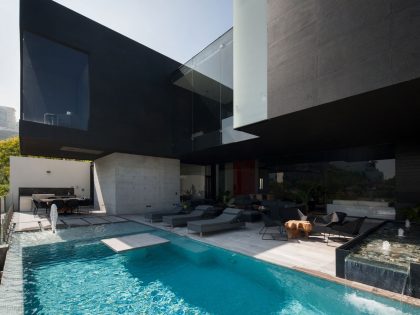 A Beautiful Modern Home with Cantilevered Volume and Floor-to-Ceiling Glass Walls in Garza Garcia by GLR Arquitectos (5)