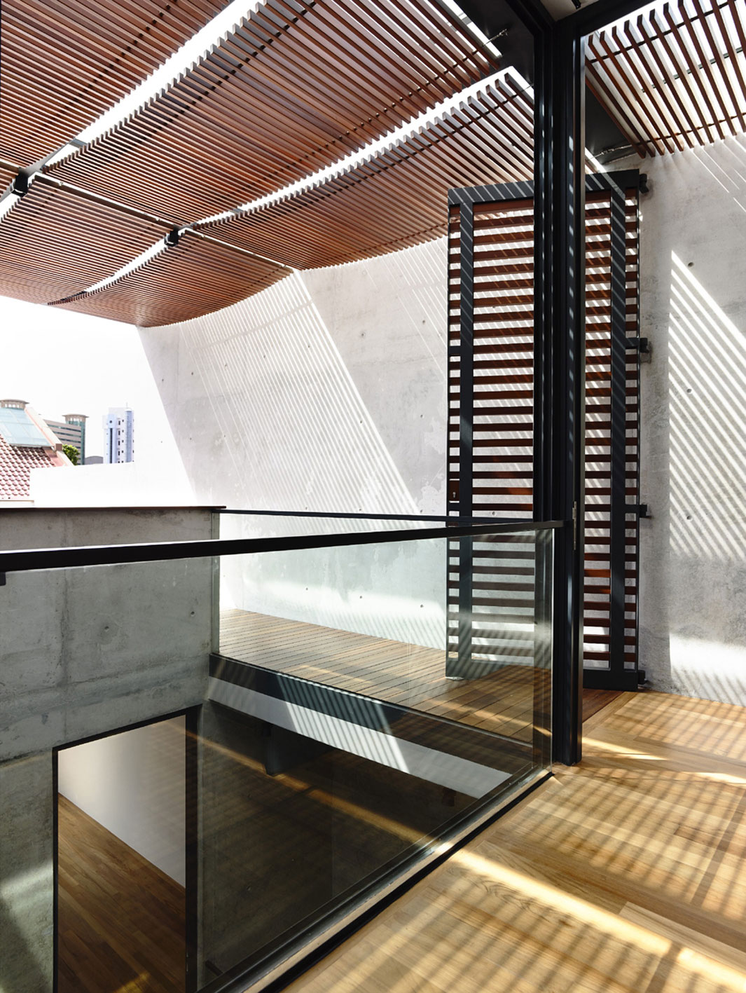 A Beautiful Modern House Made of Concrete Boxes and Timber Elements in Singapore by Hyla Architects (26)