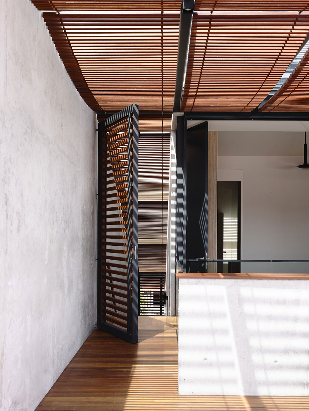 A Beautiful Modern House Made of Concrete Boxes and Timber Elements in Singapore by Hyla Architects (27)