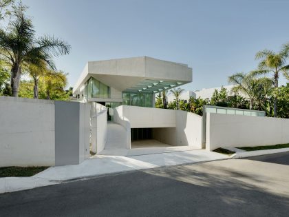 A Bright Modern Concrete Home with Cantilevered Rooftop Pool in Marbella, Spain by Wiel Arets Architects (1)