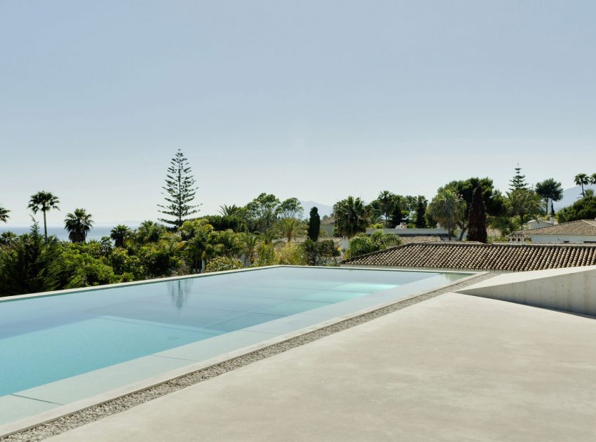 A Bright Modern Concrete Home with Cantilevered Rooftop Pool in Marbella, Spain by Wiel Arets Architects (10)