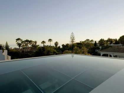 A Bright Modern Concrete Home with Cantilevered Rooftop Pool in Marbella, Spain by Wiel Arets Architects (11)