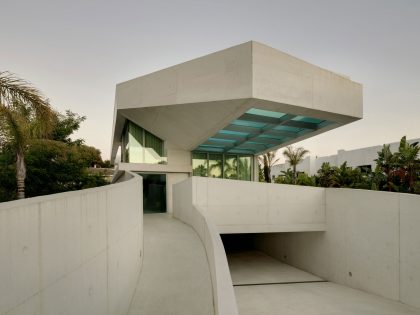 A Bright Modern Concrete Home with Cantilevered Rooftop Pool in Marbella, Spain by Wiel Arets Architects (2)