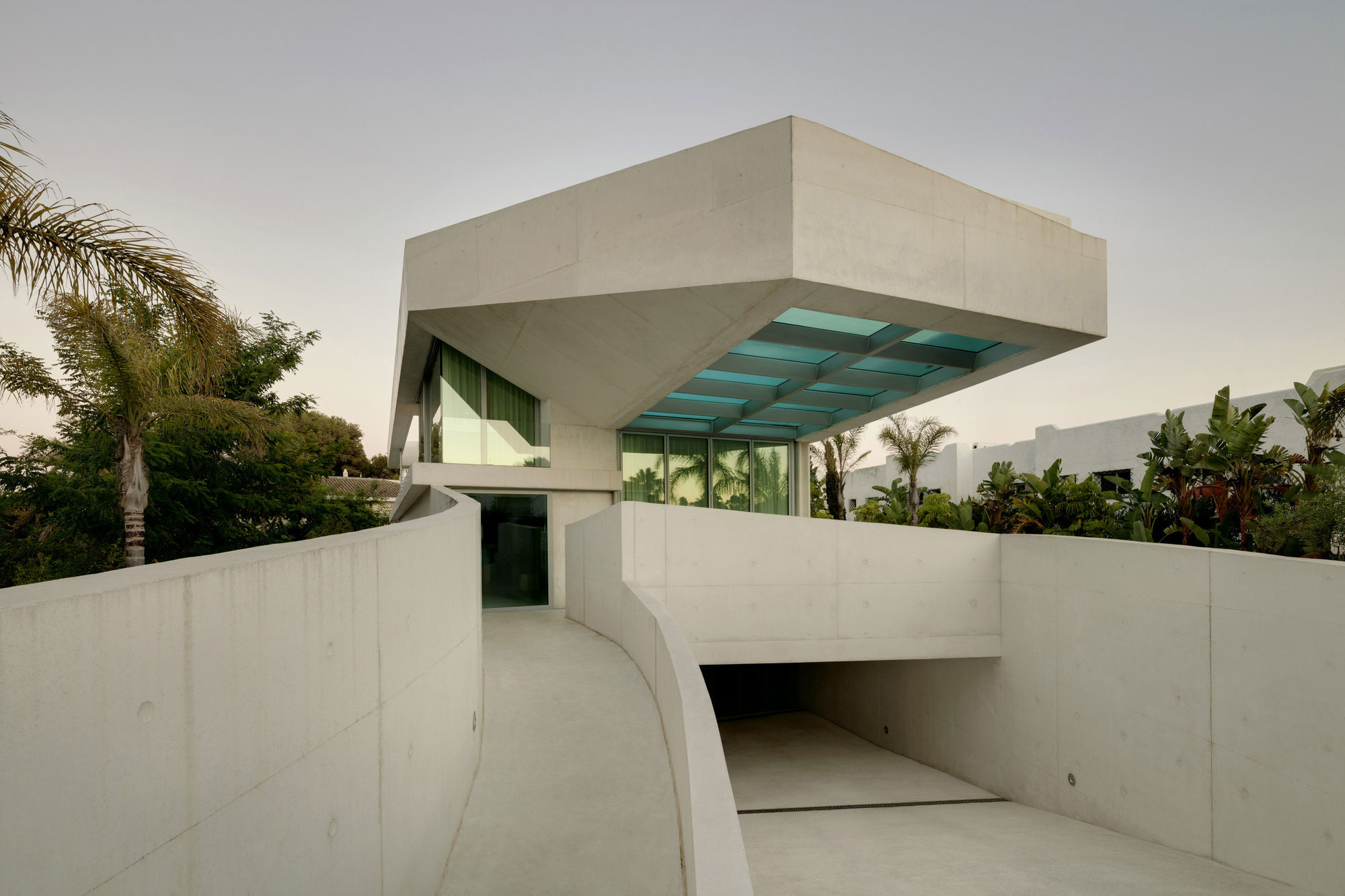 A Bright Modern Concrete Home with Cantilevered Rooftop Pool in Marbella, Spain by Wiel Arets Architects (2)