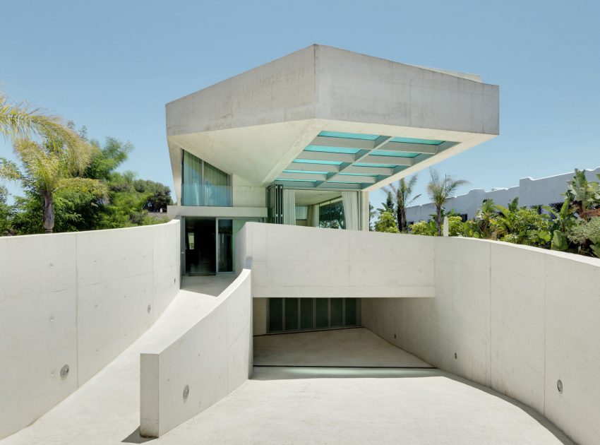 A Bright Modern Concrete Home with Cantilevered Rooftop Pool in Marbella, Spain by Wiel Arets Architects (3)