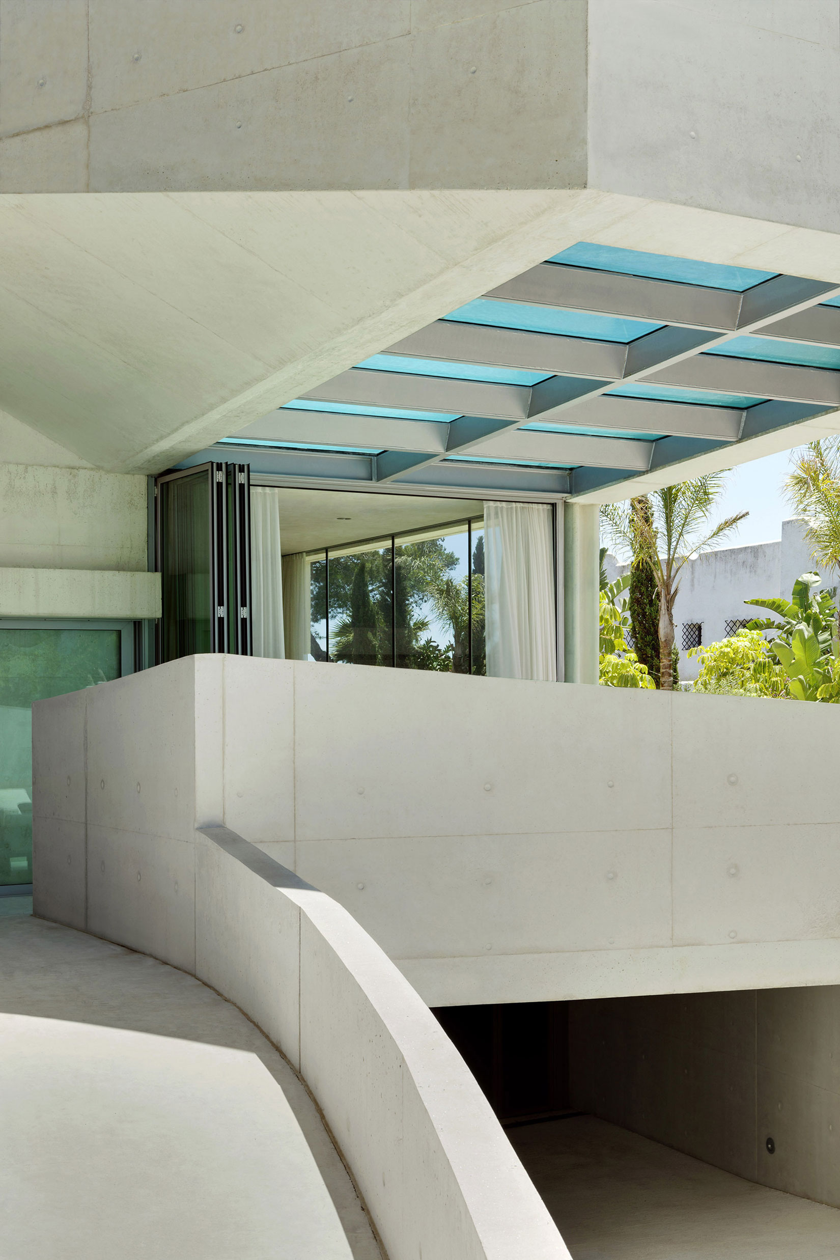 A Bright Modern Concrete Home with Cantilevered Rooftop Pool in Marbella, Spain by Wiel Arets Architects (4)