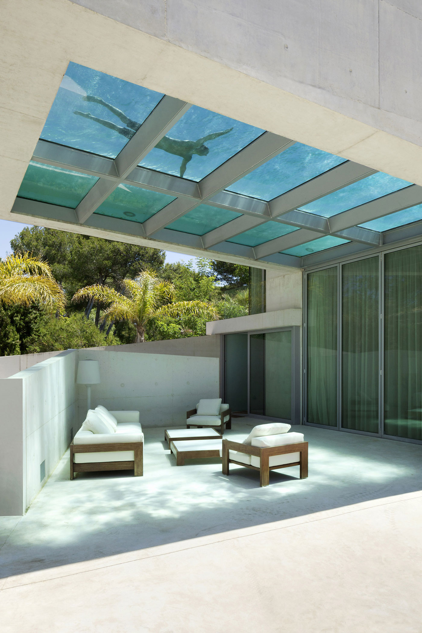 A Bright Modern Concrete Home with Cantilevered Rooftop Pool in Marbella, Spain by Wiel Arets Architects (5)