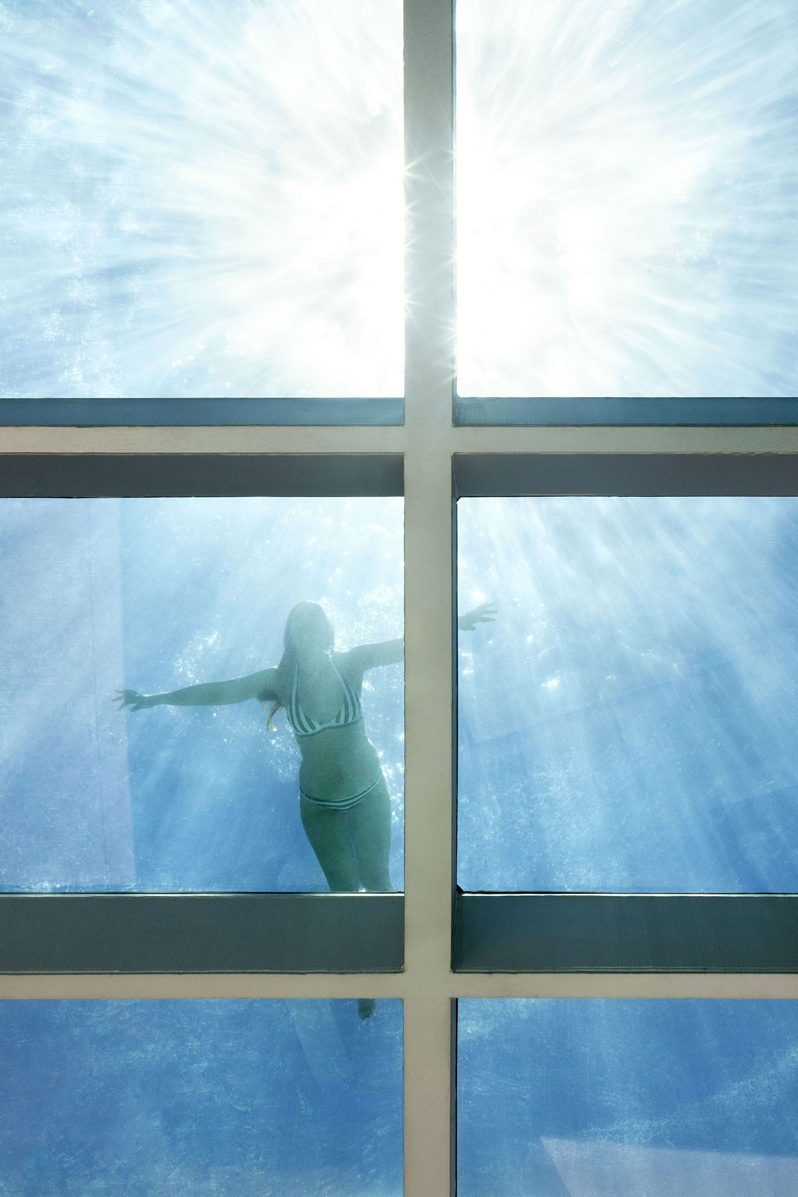 A Bright Modern Concrete Home with Cantilevered Rooftop Pool in Marbella, Spain by Wiel Arets Architects (8)