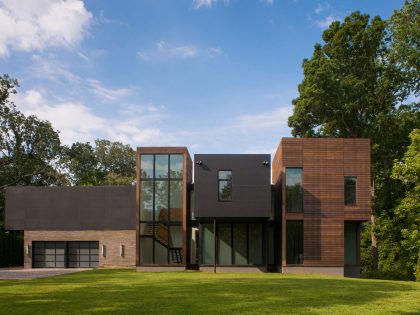 A Bright Contemporary Waterfront Home Overlaps Stone and Glass Volumes in Cabin John by Robert M. Gurney Architect (1)