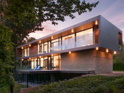 A Bright Contemporary Waterfront Home Overlaps Stone and Glass Volumes in Cabin John by Robert M. Gurney Architect (20)