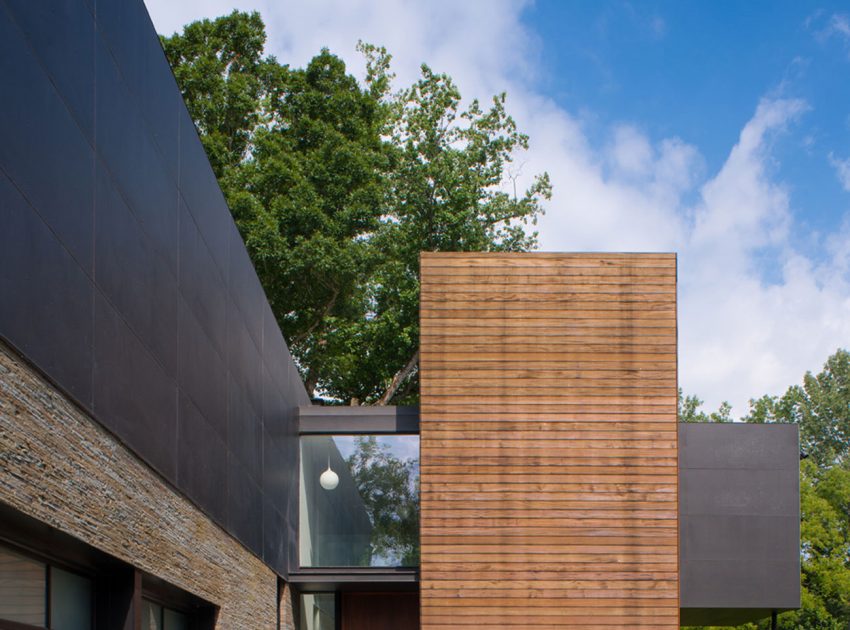 A Bright Contemporary Waterfront Home Overlaps Stone and Glass Volumes in Cabin John by Robert M. Gurney Architect (3)