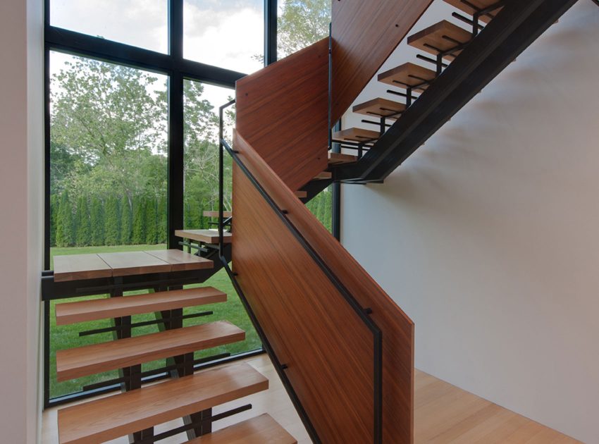 A Bright Contemporary Waterfront Home Overlaps Stone and Glass Volumes in Cabin John by Robert M. Gurney Architect (9)