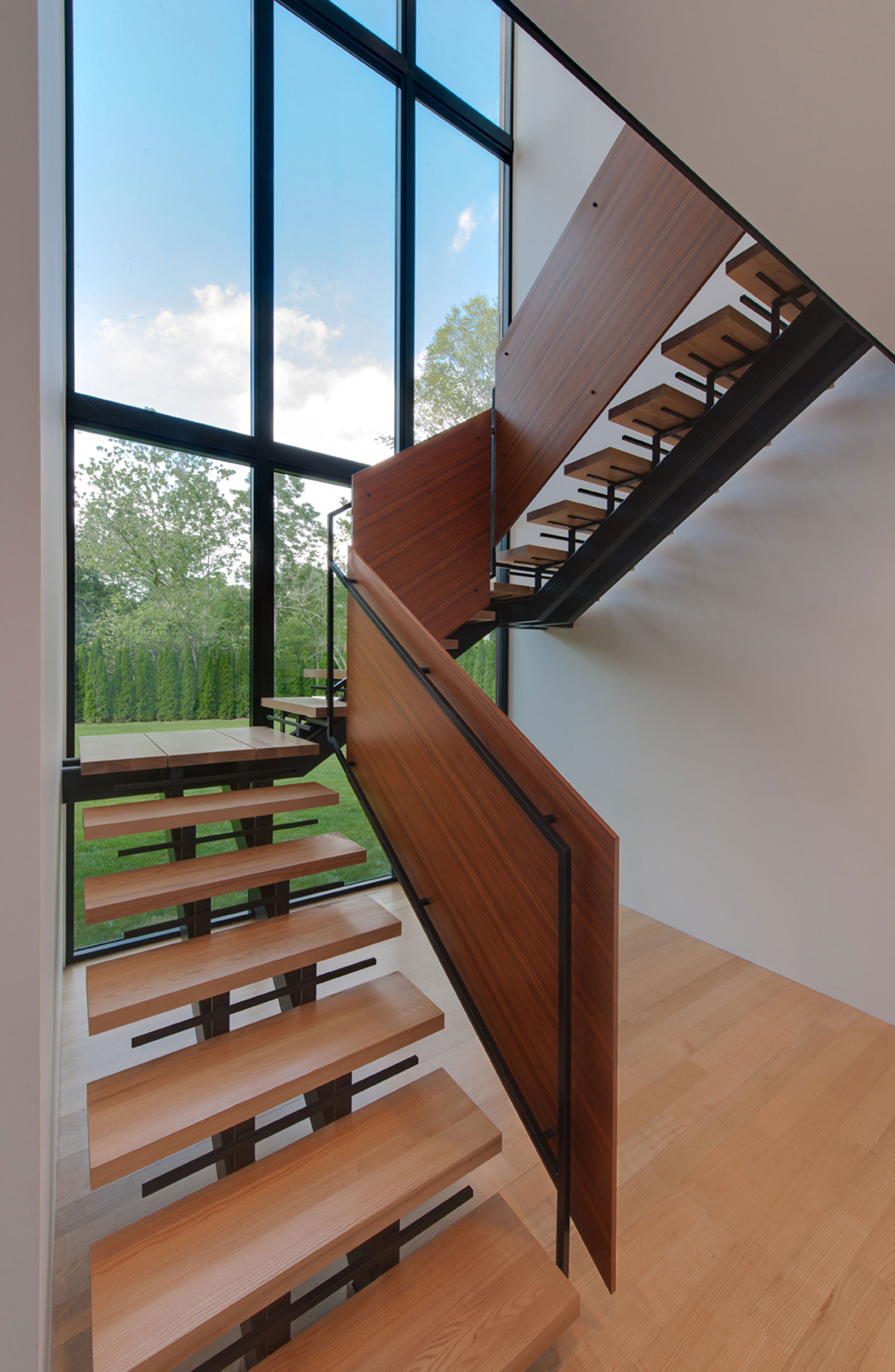 A Bright Contemporary Waterfront Home Overlaps Stone and Glass Volumes in Cabin John by Robert M. Gurney Architect (9)