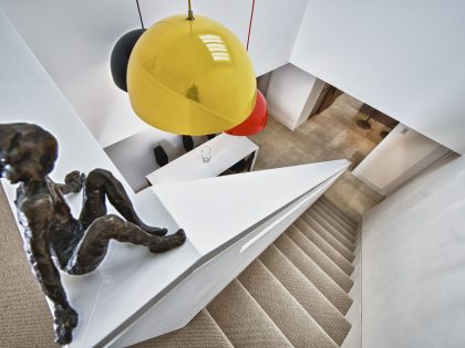 A Bright and Sleek Contemporary Home with Bold Interior Accents in London by Mimodo Architects (13)