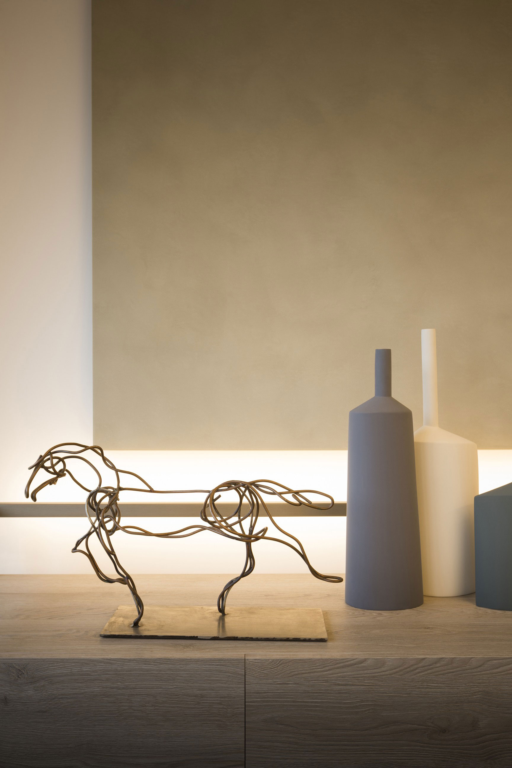 A Chic Apartment with Warm Interior and Ingeniously Light Fixtures in Milan, Italy by Matteo Nunziati (6)