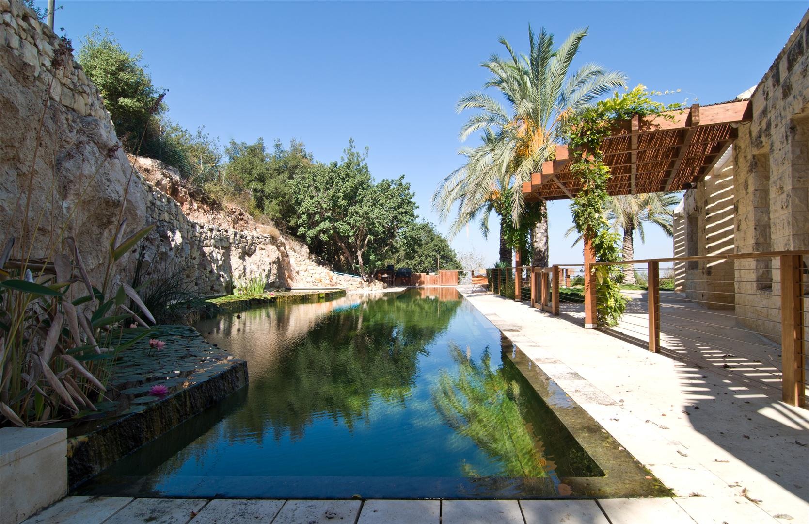 A Contemporary Stone House with Rough and Rustic Elements in Jerusalem, Israel by eran chehanowitz (2)