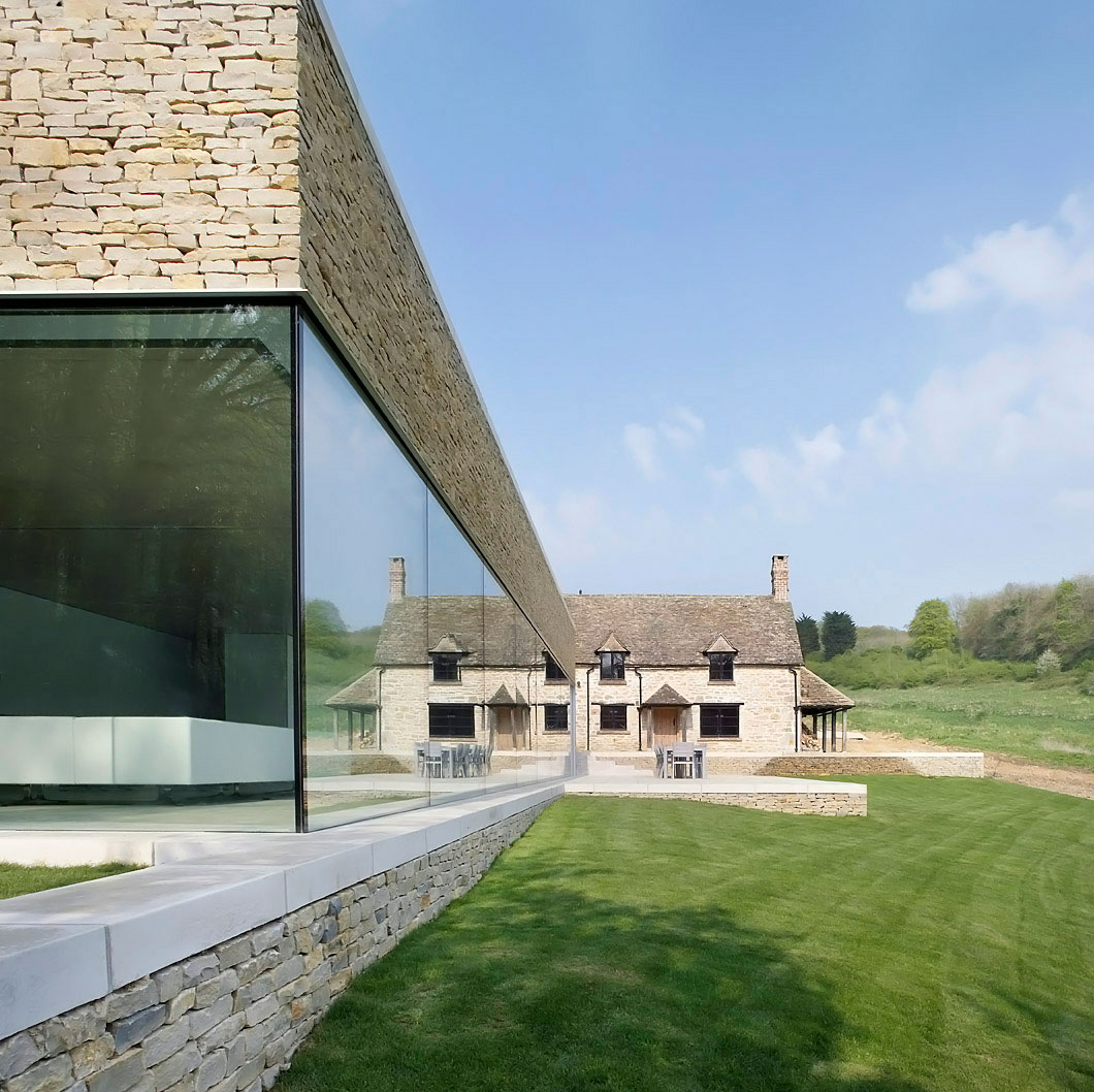 A Contemporary Vacation Home Surrounded by Perfect Landscaping and Green Rolling Grass in Cotswolds, England by Found Associates (1)