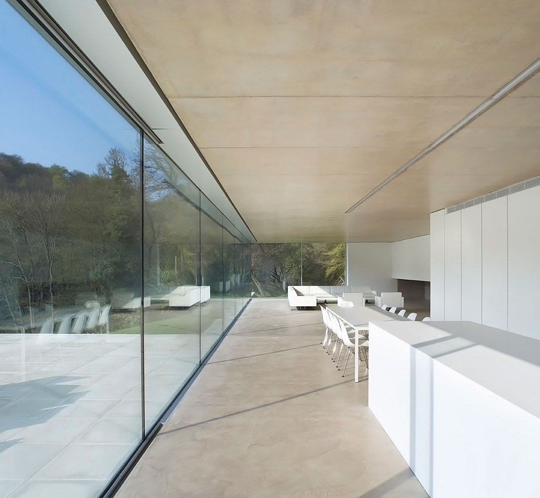 A Contemporary Vacation Home Surrounded by Perfect Landscaping and Green Rolling Grass in Cotswolds, England by Found Associates (18)