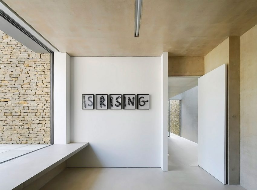 A Contemporary Vacation Home Surrounded by Perfect Landscaping and Green Rolling Grass in Cotswolds, England by Found Associates (19)