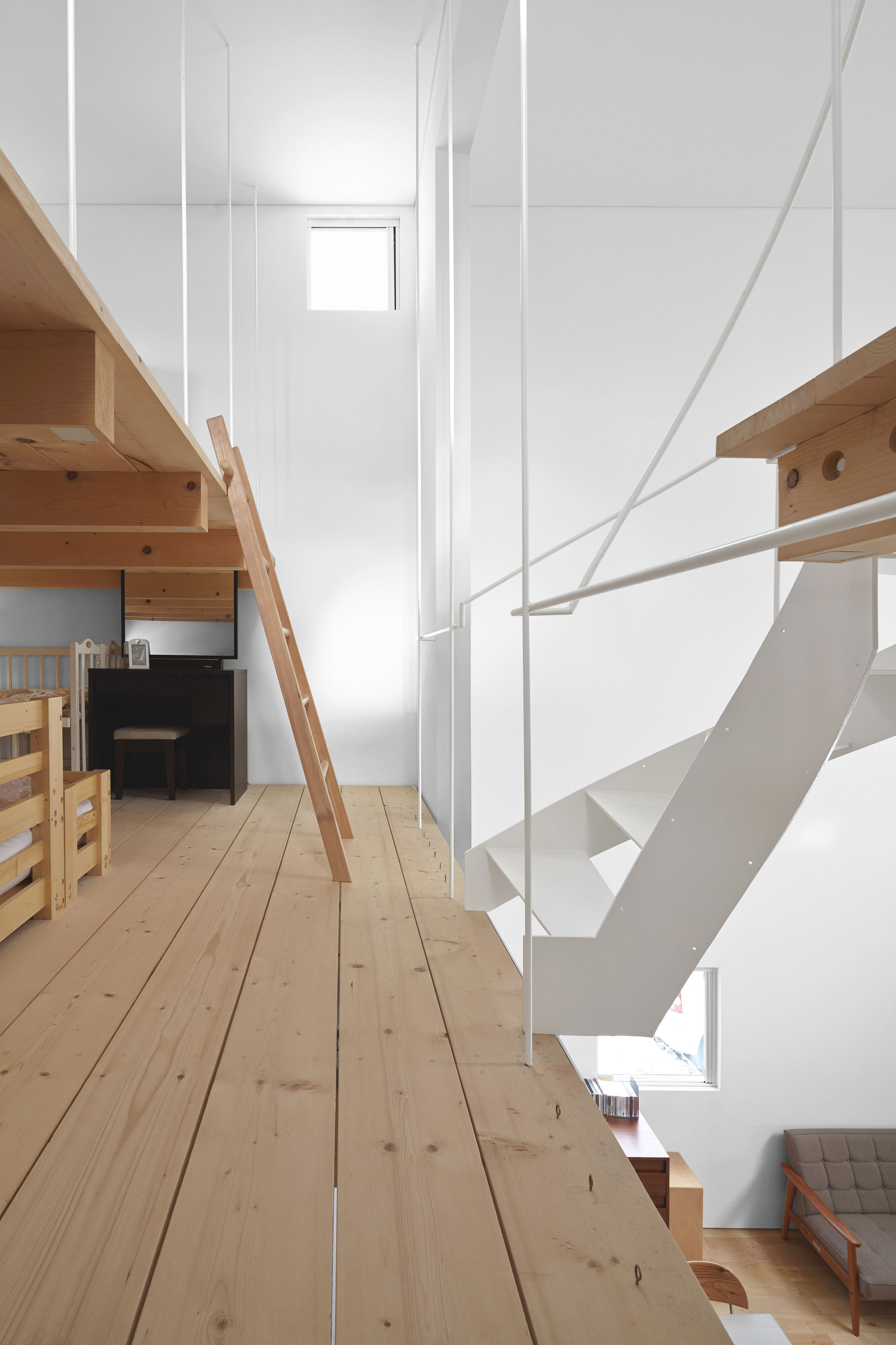 A Cozy and Bright Modern House with Two Twisting Staircases in Sapporo, Japan by Jun Igarashi Architects (13)