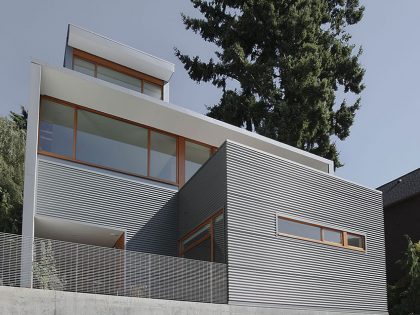 A Cozy and Luminous Modern Home Full of Concrete and Wood Elements in Seattle by SHED Architecture & Design (3)