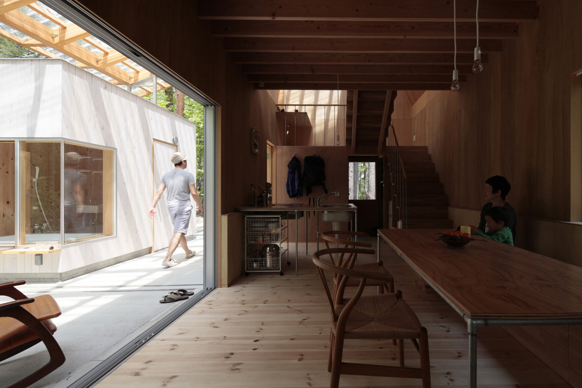 A Dramatic Contemporary Home with an Asymmetric Roof and Overhanging Eaves in Hakuba, Japan by Naka Architects (10)