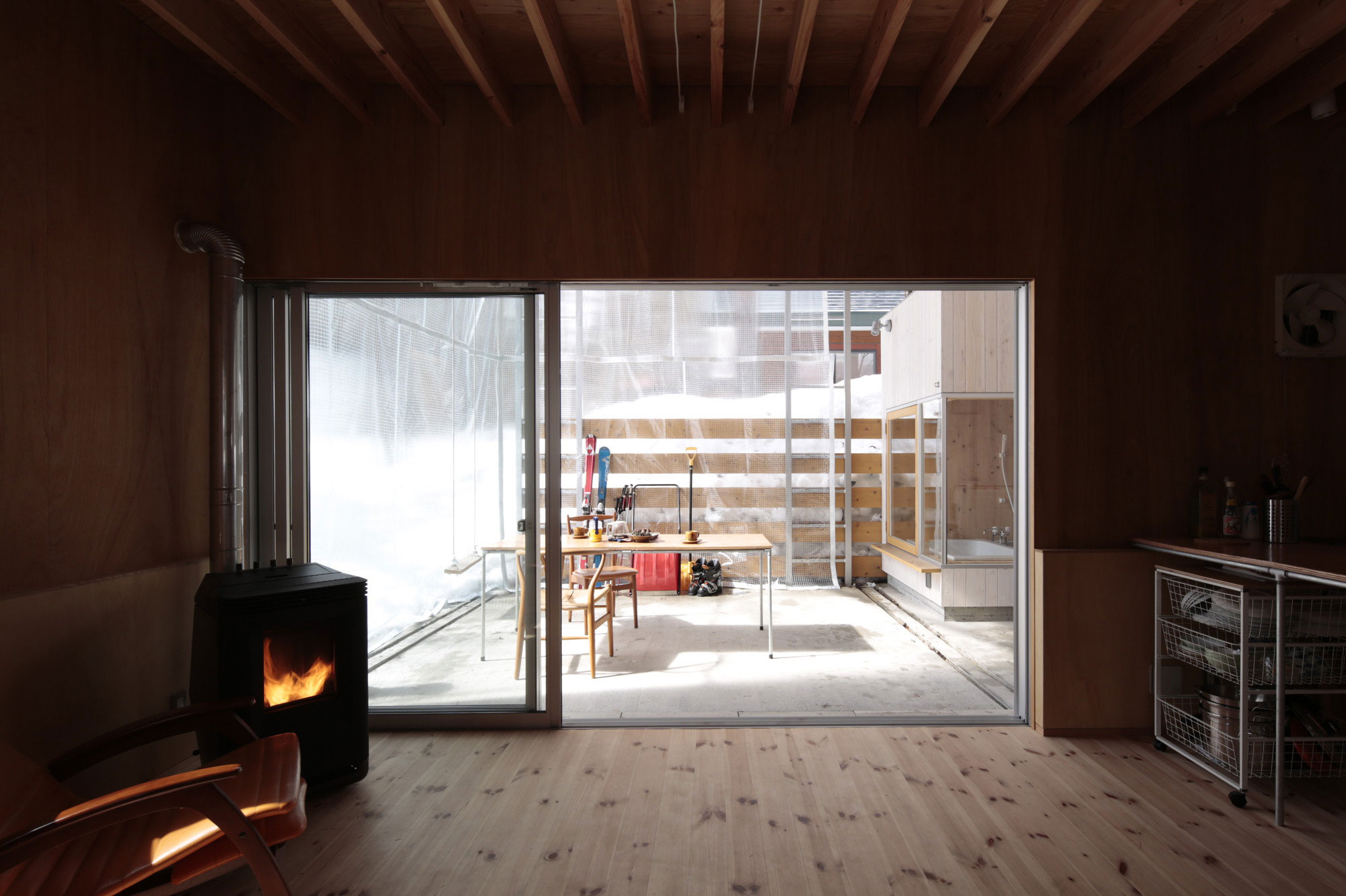 A Dramatic Contemporary Home with an Asymmetric Roof and Overhanging Eaves in Hakuba, Japan by Naka Architects (7)