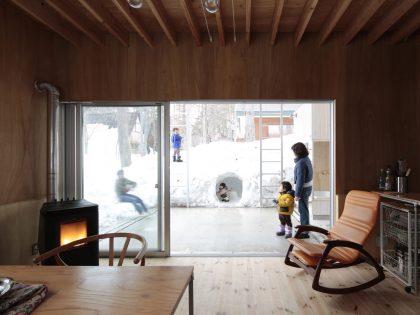 A Dramatic Contemporary Home with an Asymmetric Roof and Overhanging Eaves in Hakuba, Japan by Naka Architects (8)