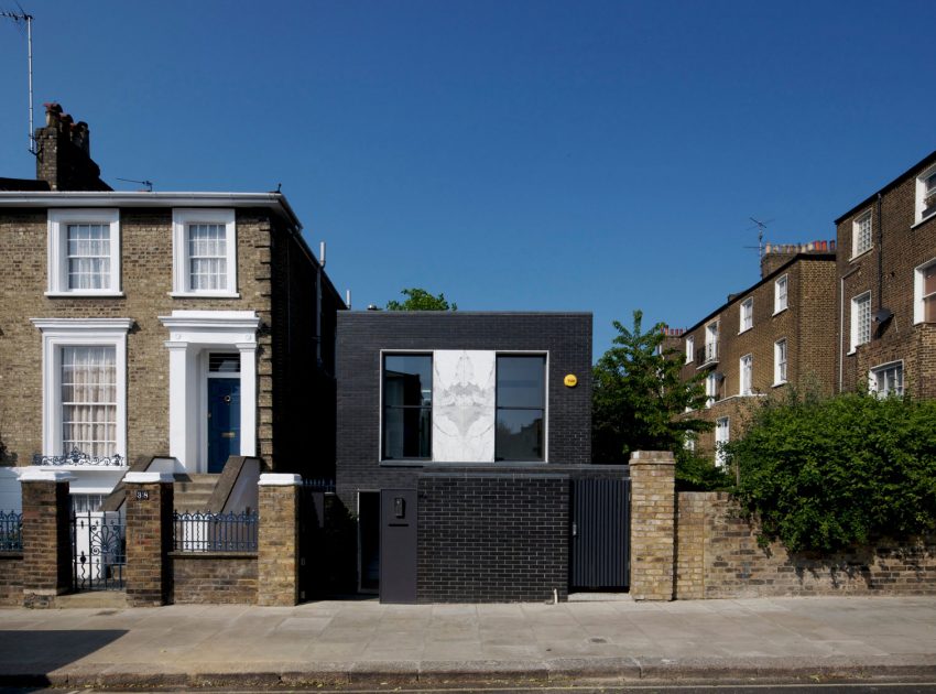A Fascinating Home with Black Engineering Bricks and Slabs of White Marble in London by Liddicoat & Goldhill (2)