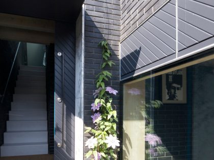 A Fascinating Home with Black Engineering Bricks and Slabs of White Marble in London by Liddicoat & Goldhill (4)