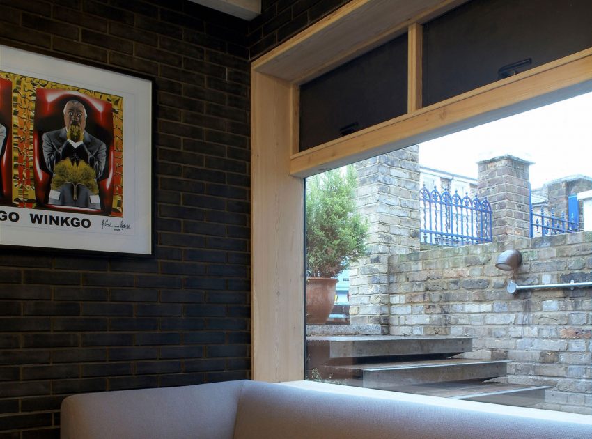 A Fascinating Home with Black Engineering Bricks and Slabs of White Marble in London by Liddicoat & Goldhill (6)