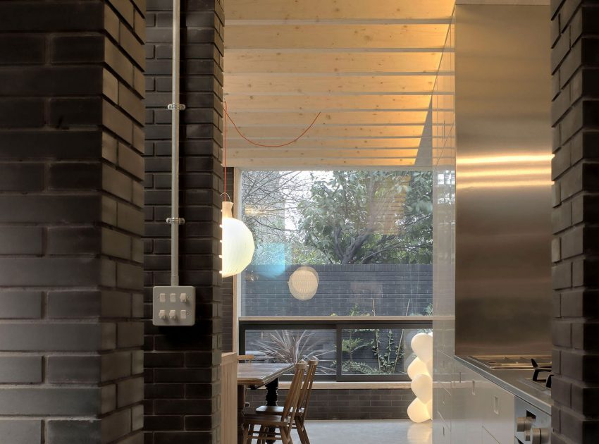 A Fascinating Home with Black Engineering Bricks and Slabs of White Marble in London by Liddicoat & Goldhill (7)