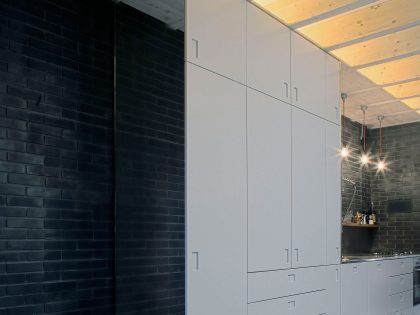 A Fascinating Home with Black Engineering Bricks and Slabs of White Marble in London by Liddicoat & Goldhill (8)