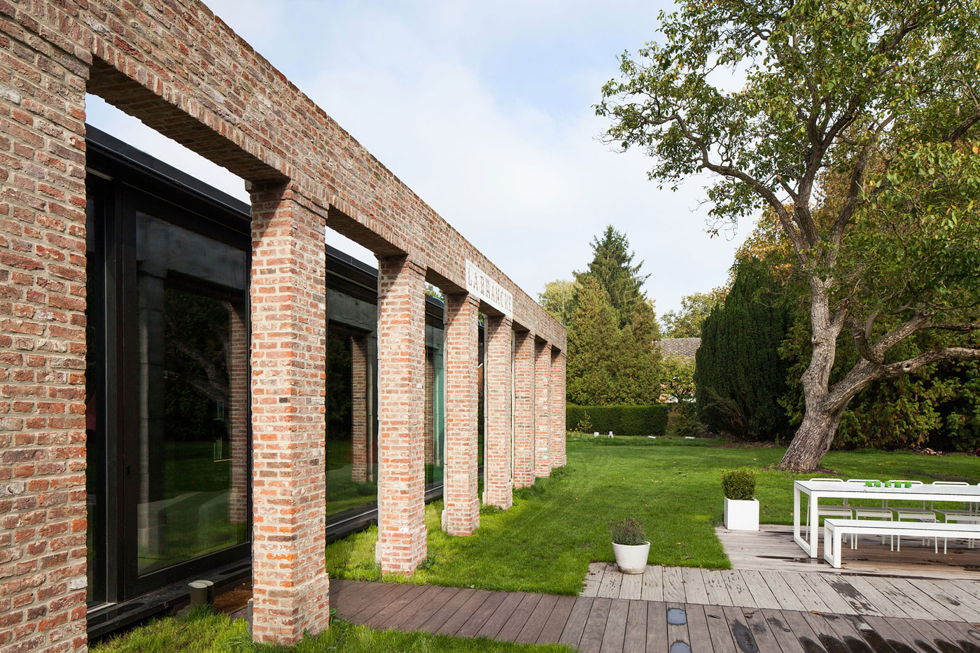 A Former Hunting Lodge Transformed into a Sleek Modern Family Home in Heverlee, Belgium by DMOA Architecten (11)