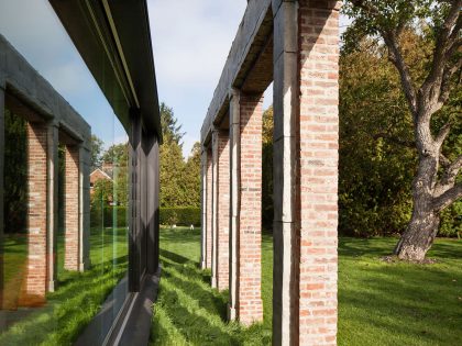 A Former Hunting Lodge Transformed into a Sleek Modern Family Home in Heverlee, Belgium by DMOA Architecten (12)