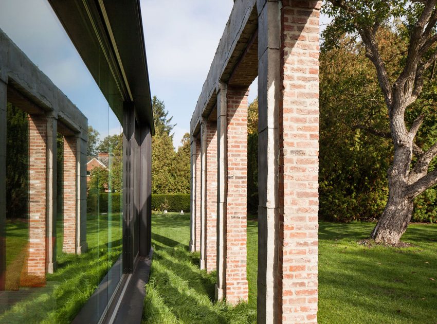 A Former Hunting Lodge Transformed into a Sleek Modern Family Home in Heverlee, Belgium by DMOA Architecten (12)