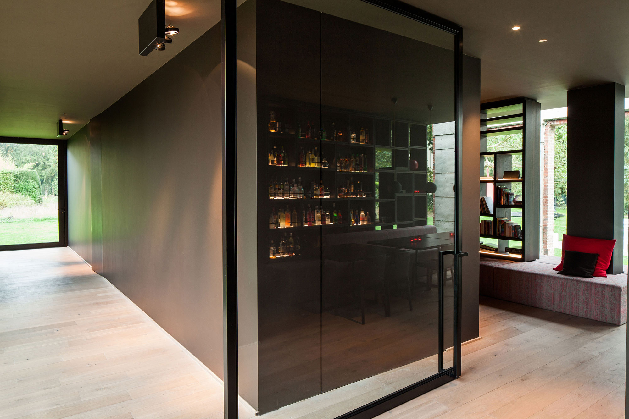 A Former Hunting Lodge Transformed into a Sleek Modern Family Home in Heverlee, Belgium by DMOA Architecten (15)